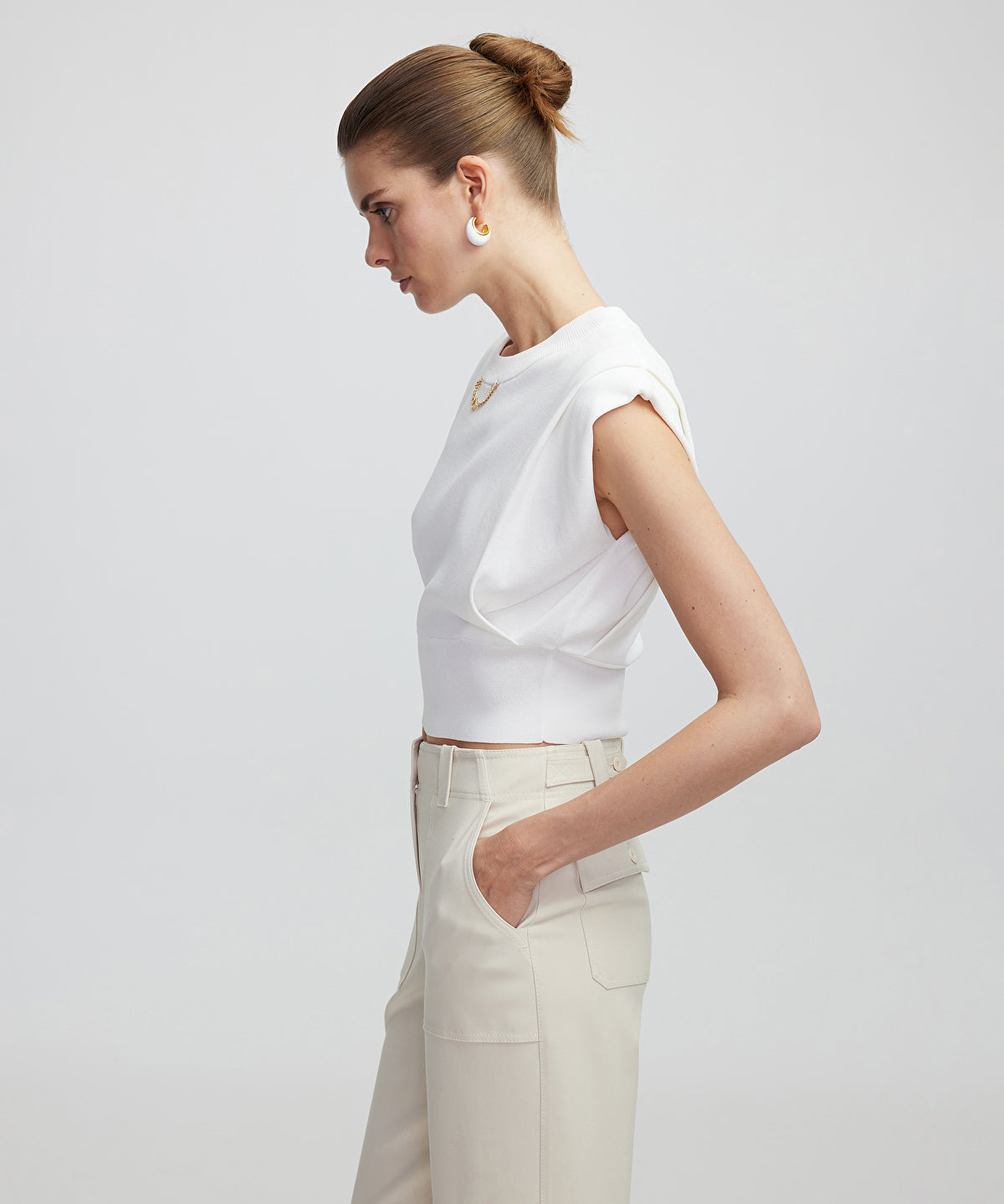 Knit top with chain detail