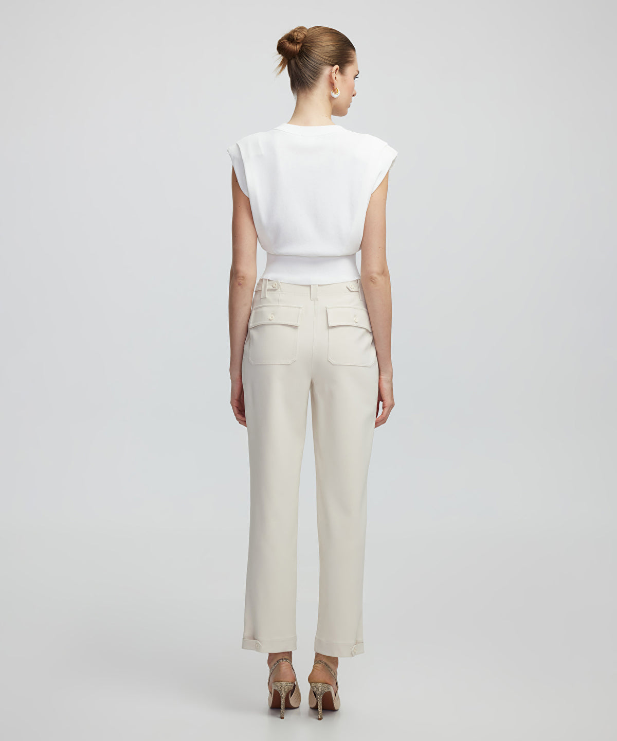 Knit top with chain detail