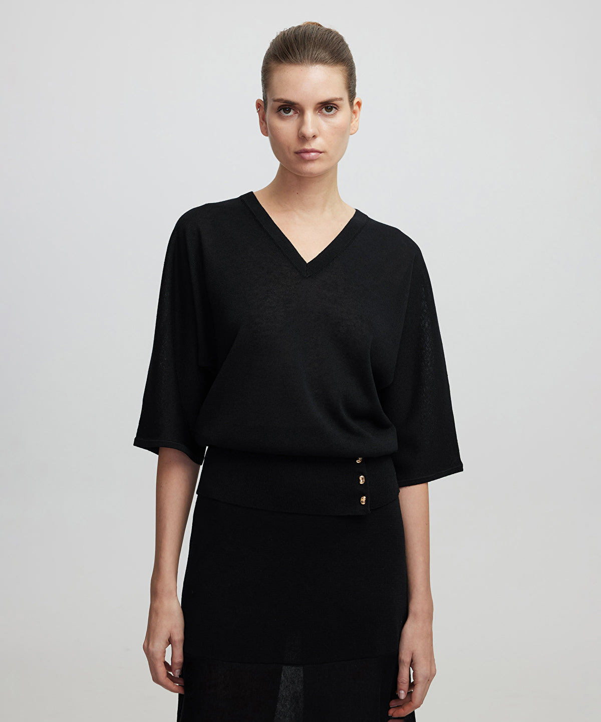 Zoomed Buttoned Knit Top