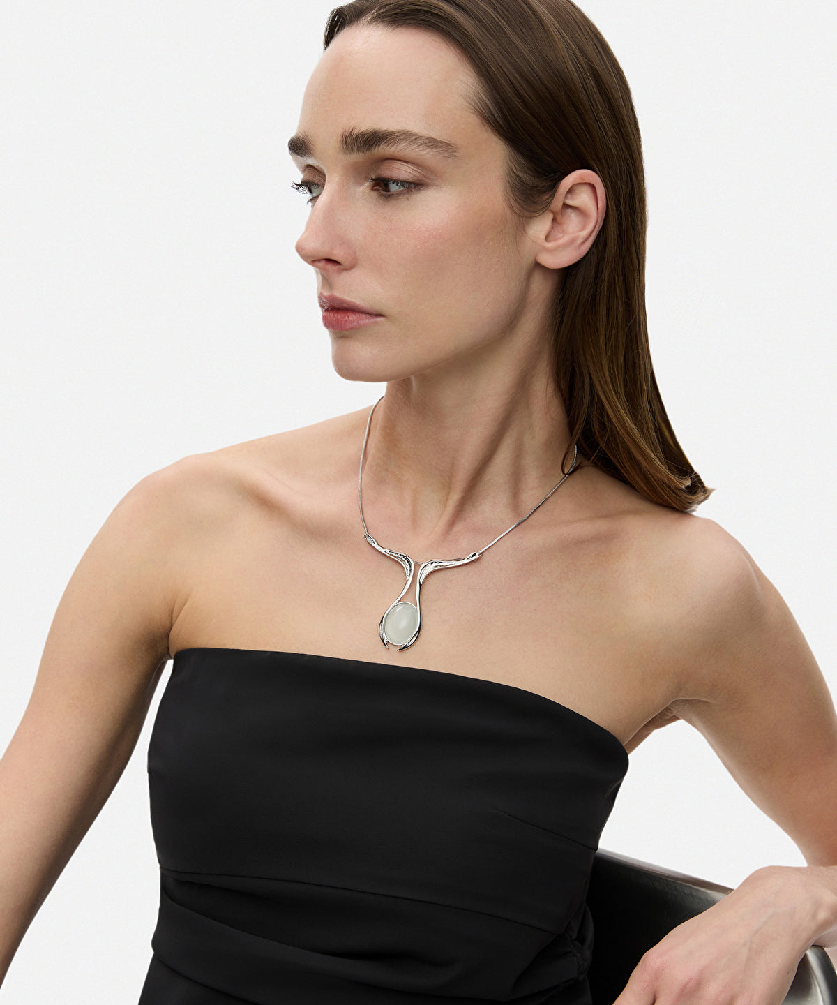 Necklace with contrasting resin pendant