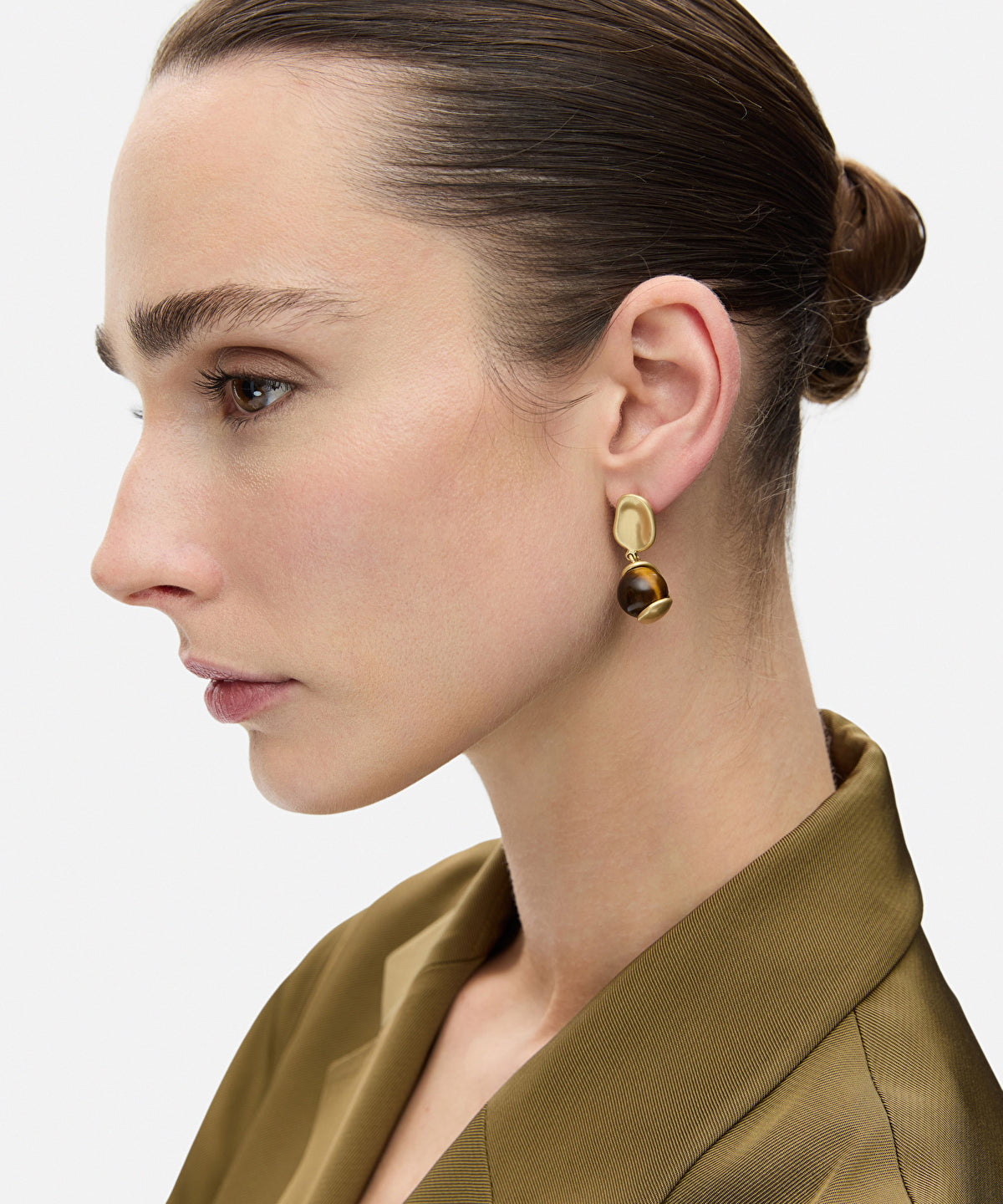 Earrings set with contrasting stones