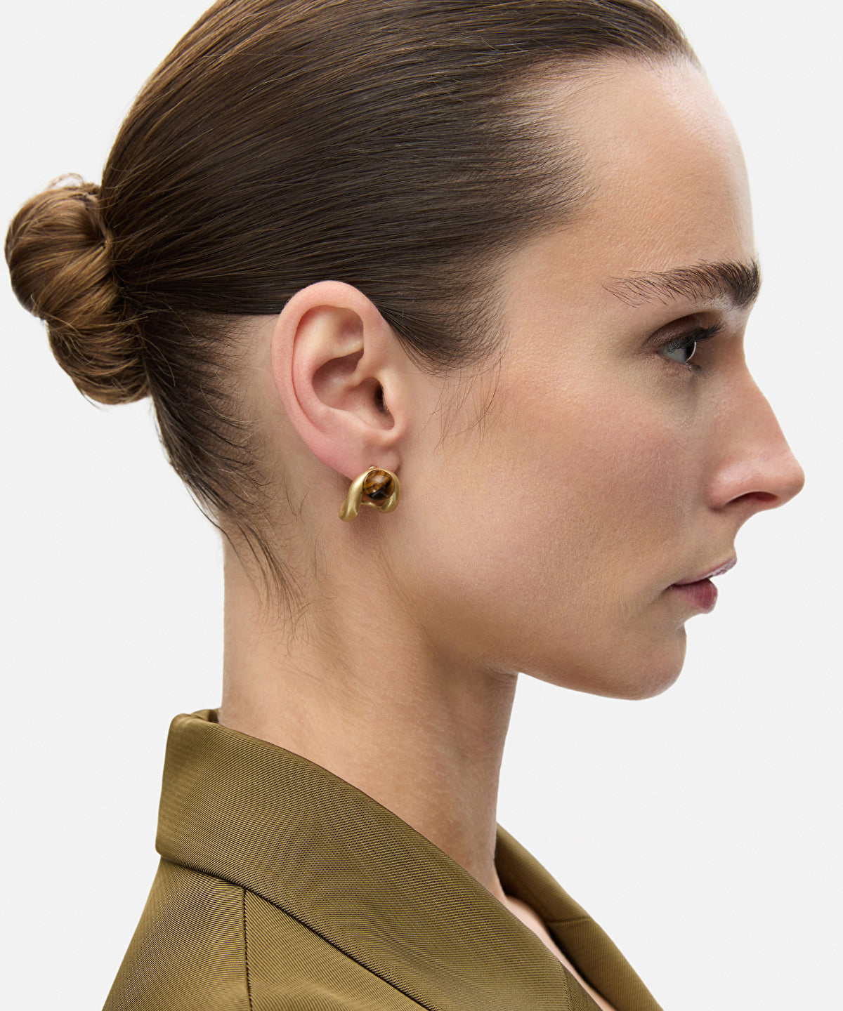 Earrings set with contrasting stones