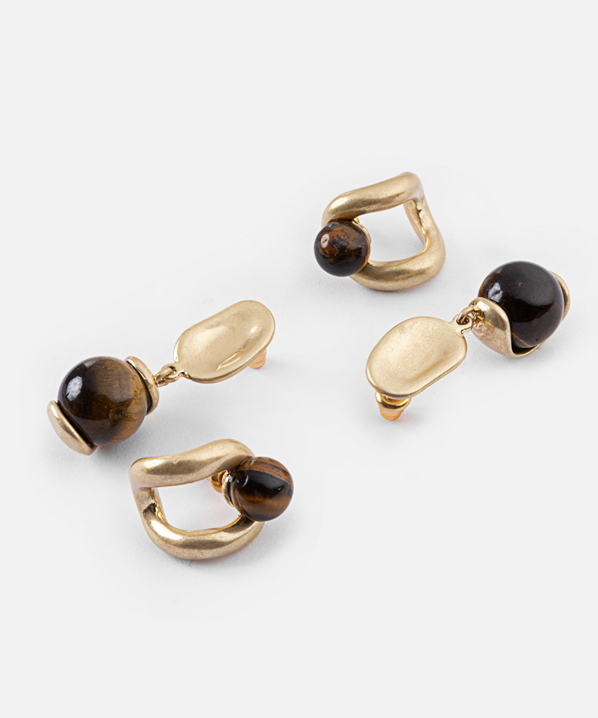Earrings set with contrasting stones