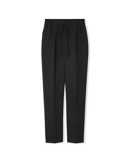 Carrot fit trousers