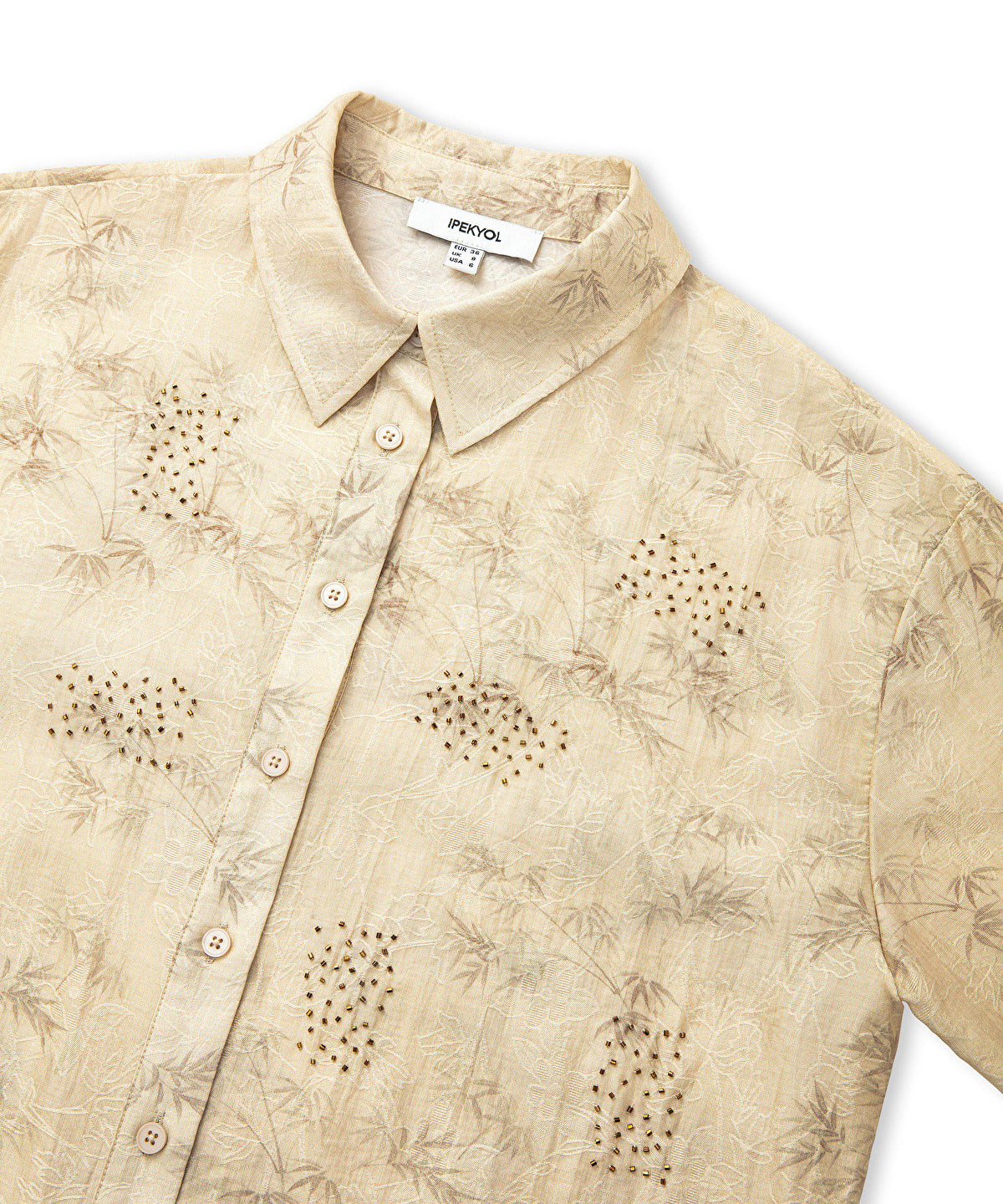 Embroidered and jacquard shirt