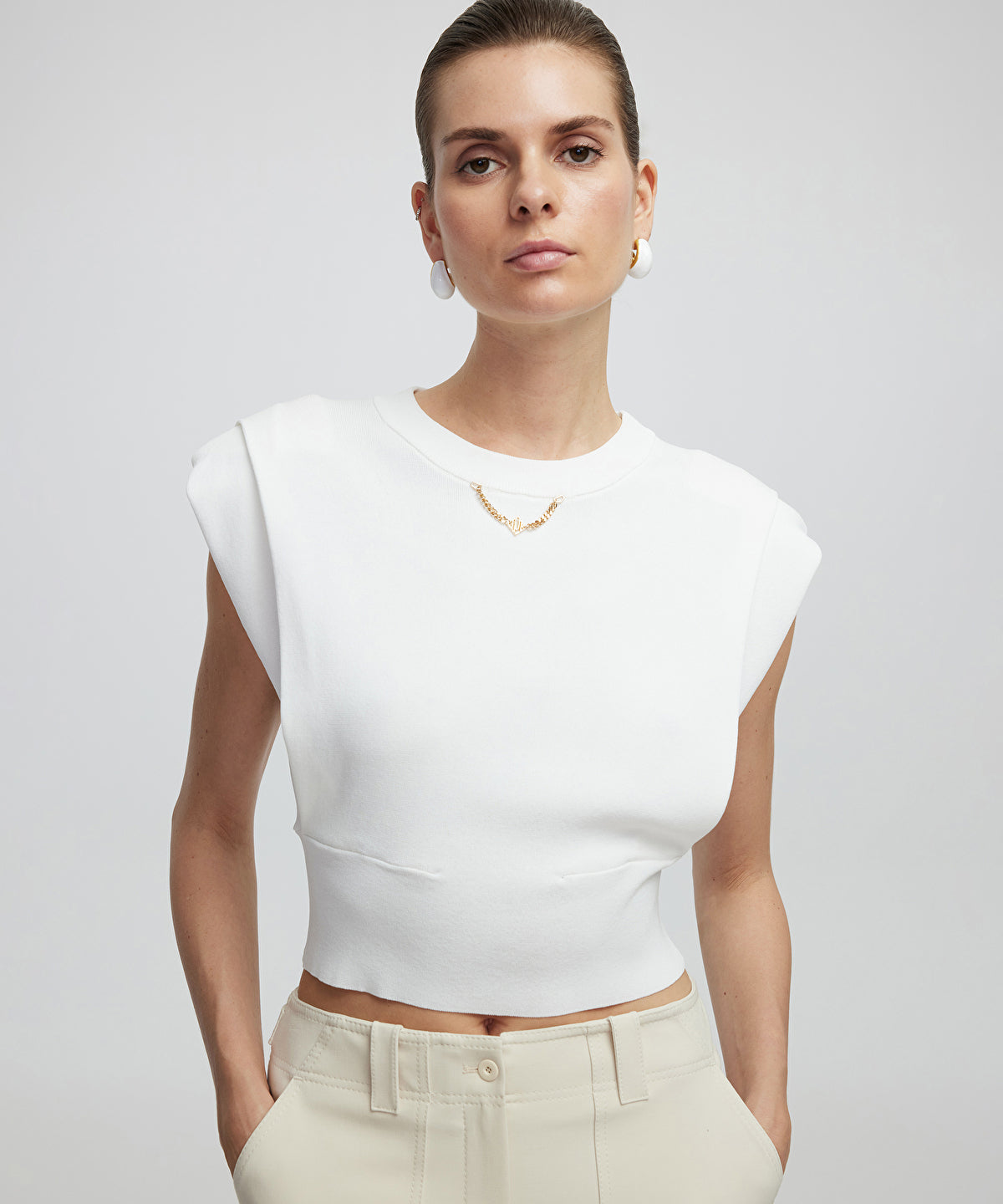 Zoomed Knit Top With Chain Detail