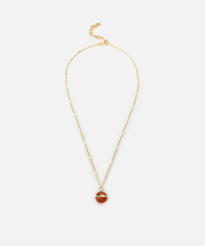 Metal necklace with contrasting pendant