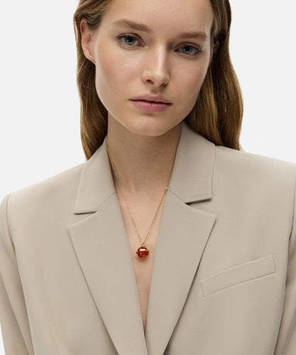 Metal necklace with contrasting pendant