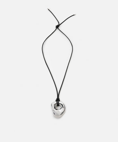 Cord necklace with metal pendant