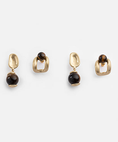 Earrings set with contrasting stones