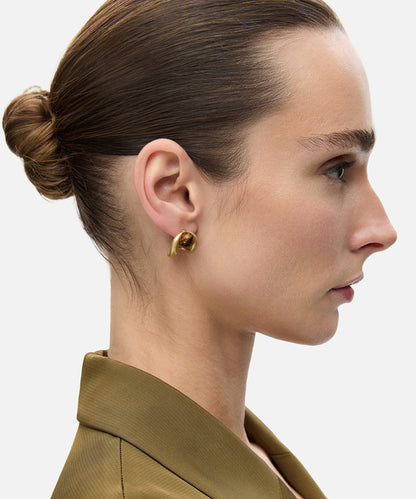 Earrings set with contrasting stones
