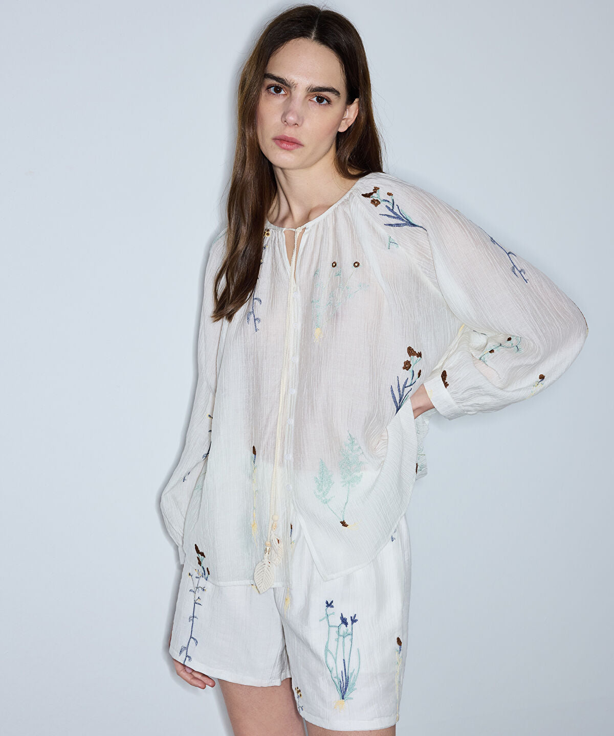 Zoomed Textured Floral Embroidered Blouse