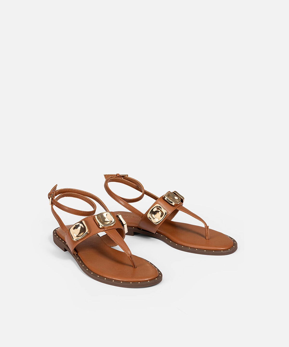 Zoomed Metal Accent Sandals