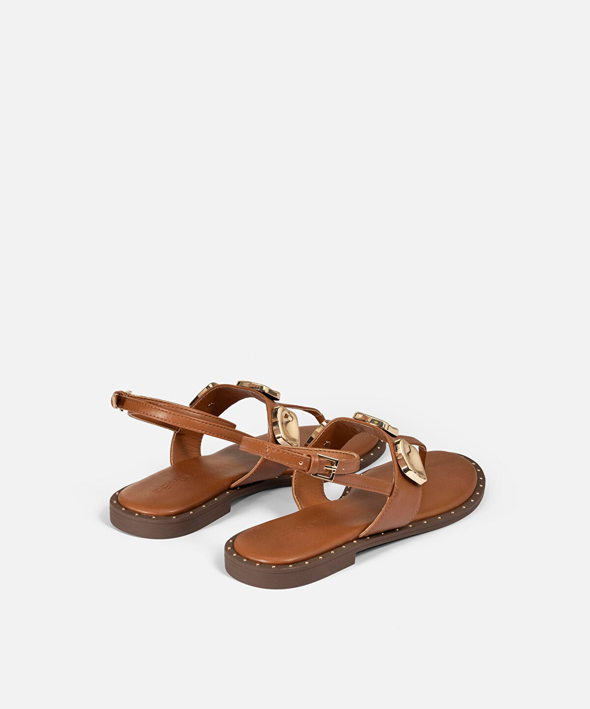 Zoomed Metal Accent Sandals