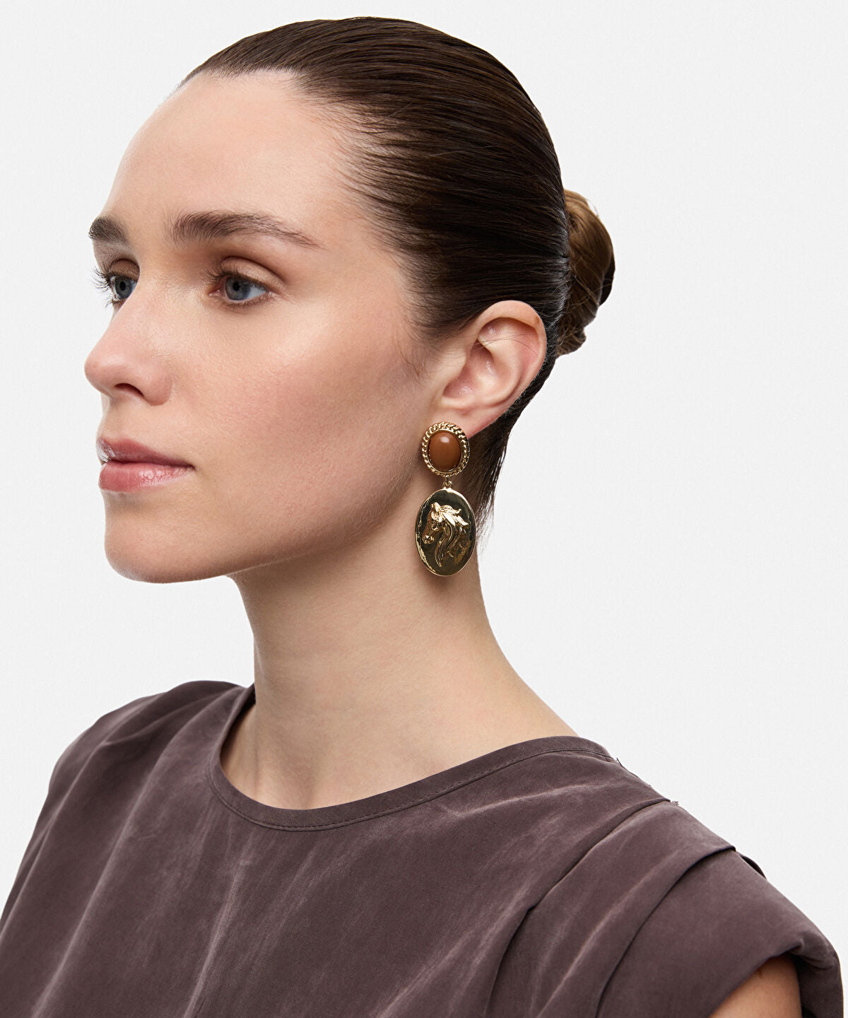 Zoomed Dangling Horse Earrings